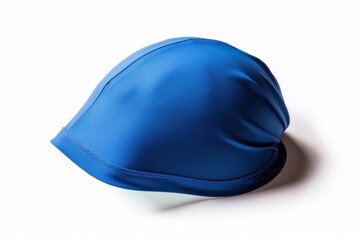Fototapeta premium Blue swimming cap isolated on white background. The image displays a neatly placed blue cap used for swimming