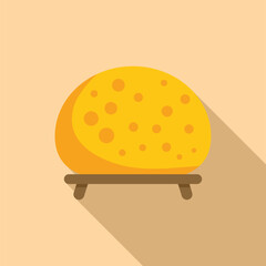 Round piece of hard cheese maturing on wooden shelf, dairy product