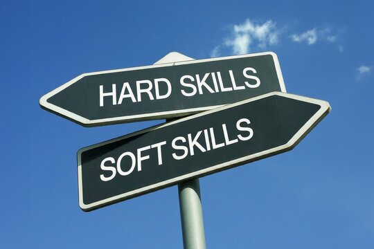 Hard Skills vs Soft Skills - Traffic sign with two options - dilemma between abilities and capabilities. Technical and practical knowledge vs social and emotional interaction and skillfulness
