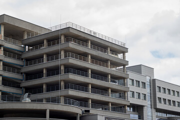 A towering structure with ample parking spots near it