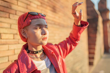 Gen z girl leather fashion with punk Asian woman tourist of local city Southeast Asia travel trendy...