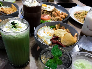 Close-up images of food being served, which can be found at various events. Consisting of various types of food on the table that have been served.