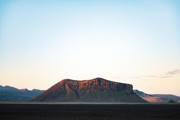 Stunning view of a dramatic landscape during a breathtaking sunset.Icelandic nature offers an incredible variety of landscapes, from fjords, to mountains, to glaciers, to lava fields.