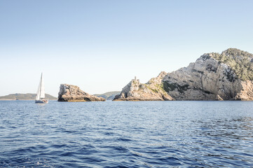 Sailingboat setting sails around Balearic Islands in Spain