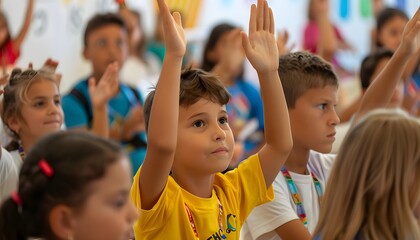 Fototapeta premium Group of engaged children in a classroom, actively participating by raising their hands during a lesson, displaying enthusiasm and curiosity.