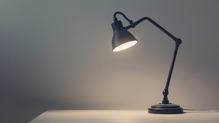 Minimalist Workspace Concept with Stylish Desk Lamp Illuminating Clutter-Free Area against White Background