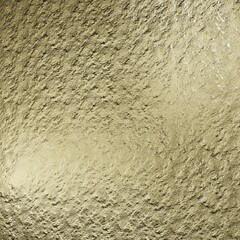 textured, gold-colored surface. The surface has a rough, uneven texture that resembles a hammered metal
