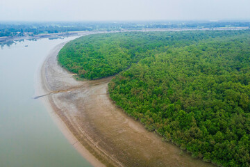 Aerial view of Sundarbans mangroves forest with water channels and rivers. Natural Indian reserve....