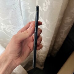 close up of hand holding phone