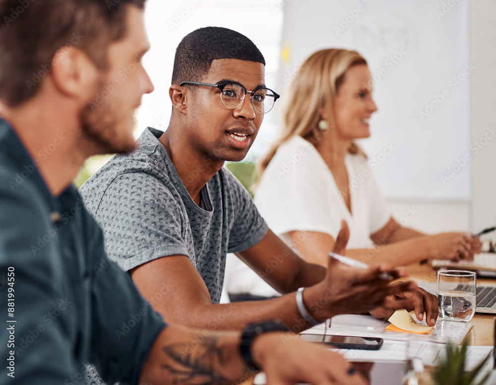 Canvas Prints Talking, brainstorming and man at desk for business meeting, teamwork and together for project. People, communication or discussion in conference room for agenda, ideas or collaboration for planning