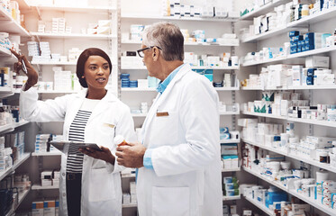 Healthcare, people and discussion with tablet in pharmacy for inventory, inspection and...