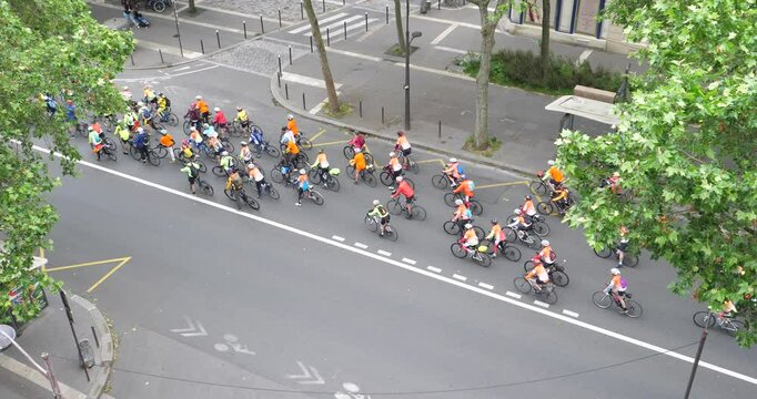 An aerial view of some cyclists in the Daumesnil avenue. Paris, France - June 2, 2024.