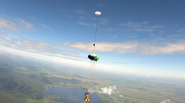 A girl skydiving with an instructor