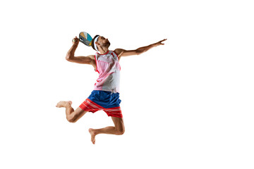 Sportive and competitive young man, tennis layer in motion with colorful paddle racket, playing...