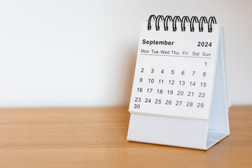 2024 calendar - September month page on the wooden desk