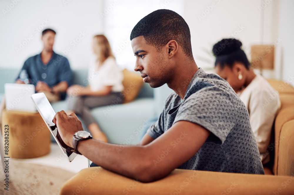 Poster tablet, research and man on sofa in office for coworking space with online trading app. digital tech