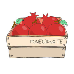 Fresh organic tropical red fruit pomegranate in a wooden box