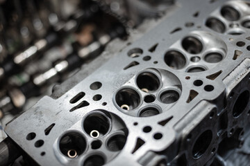 Engine valve car maintenance.The cylinder block of the four-cylinder engine. Disassembled motor...