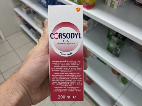 Prague, Czech Republic - July 10 2024: CORSODYL bottle of mouthwash with CHLORHEXIDINE active substance by GLAXOSMITHKLINE, used for oral hygiene and treatment of gum disease.

