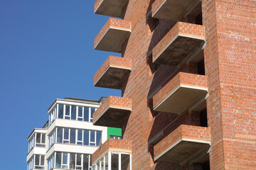 Construction of a new house against the blue sky.