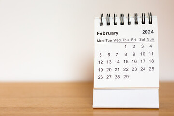 2024 calendar - February month page on the wooden desk