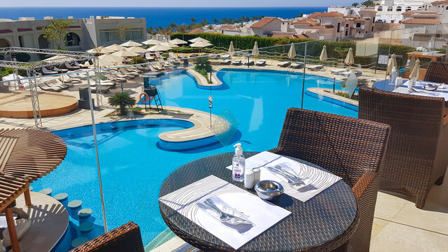 AFRICA, EGYPT, 20, MAY, 2021: Panoramic view from veranda of restaurant on swimming pool and bar in new hotel of Sunrise Montemare Resort Grand Select 5 stars, Hadaba district, Sharm el Sheikh, Egypt.