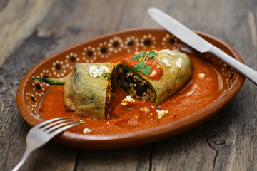 chile relleno (fried poblano pepper stuffed with minced meat and coated with egg meringue), Mexican cuisine