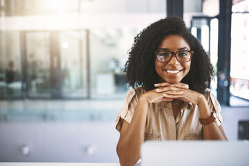 Portrait, smile and confident black woman with laptop, glasses and business development manager at desk. Office, opportunity and happy consultant with online project, pride and job at advisory agency