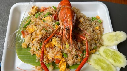 Fried rice with shrimp and lobster .Thai famous street food shrimp fried rice.Thai shrimp fried rice or kao pad goong.