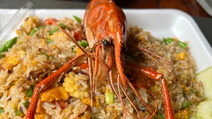 Fried rice with shrimp and lobster .Thai famous street food shrimp fried rice.Thai shrimp fried rice or kao pad goong.