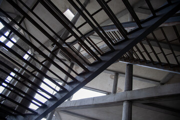 Fototapeta premium abandoned building structure with a metal ladder