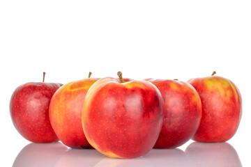 Several red apples, macro, isolated on white background.