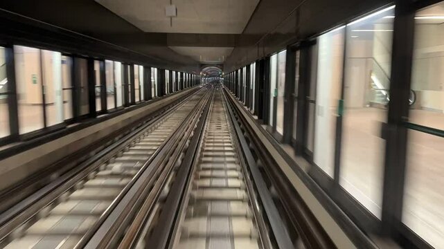 4K. Time lapse automatic train subway tunnel fast speed. Metro subway with a tunnel and a train moving fast. Tube lines in the tunnel. 4K.Time lapse automatic train subway tunnel fast speed
