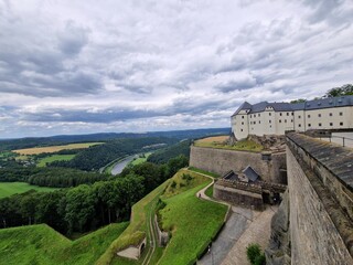 Königstein Fortress the "Saxon Bastille", is a hilltop fortress near Dresden, in Saxon Switzerland, Germany, above the town of Königstein on the left bank of the River Elbe.