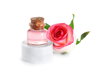 Plaster podium with bottle of essential oil and rose flower on white background