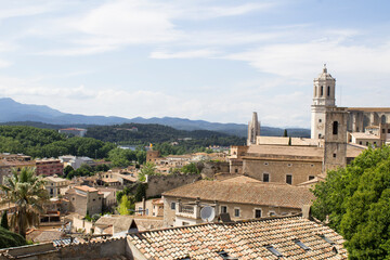 Obraz premium View of the old town and cathedral on a summer day. Top view. Gerona. Spain.