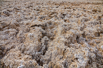 Soil science. An ephemeral lake in the desert that does not periodically fill with water. Puffed solonchak, saline deposits at the current time. Iranian deserts. Heave closeup