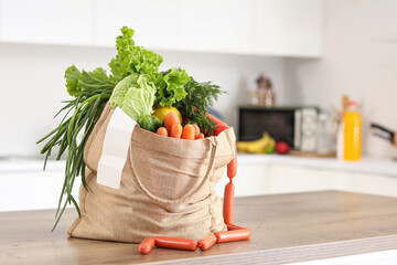 Bag full of groceries in kitchen