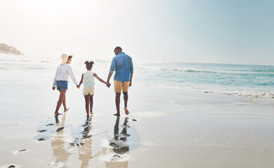 Happy family, back and walking with holding hands on beach for bonding, holiday or outdoor weekend. Mother, father and child enjoying stroll on sand in sunshine together by ocean coast in nature © ReeseArcurs/peopleimages.com