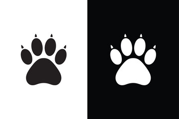Dog or cat paw print flat icon for animal apps. Paw icon vector illustration. paw print sign and symbol black white background © Nezamur