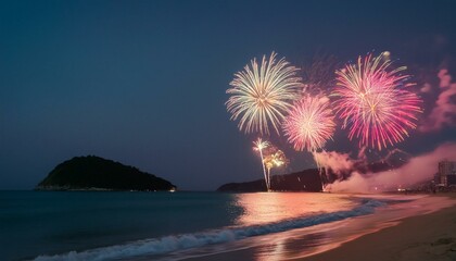 Fireworks light up the beach night sky
