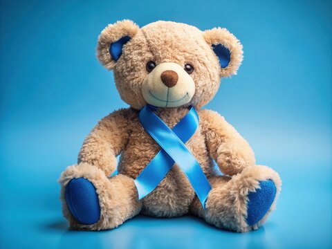 A cuddly teddy bear adorned with a blue awareness ribbon sits alone on a calming blue background, symbolizing love and support on Autism Awareness Day. - Powered by Adobe