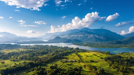 Fototapeta premium Scenic Landscape of Mountains and Fields with Lake