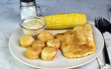 baked haddock  with scallops and corn