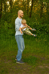 father and son in the park.