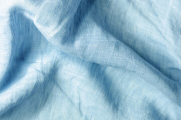  Textile background soft and crumpled light blue linen. High quality photo