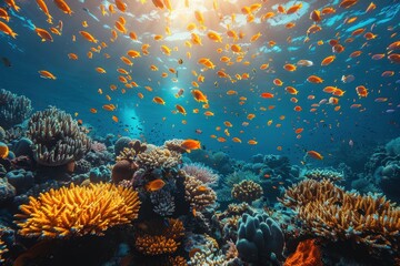 Fototapeta premium A vibrant coral reef teeming with colorful fish and marine life, showcasing the beauty of underwater ecosystems. 