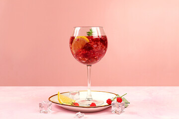 Royal lemonade cocktail with tequila, gin, rum, vodka, liqueur, lime, ice and fresh raspberries, bar and party concept, advertising card for restaurant and cafe, minimal background, .
