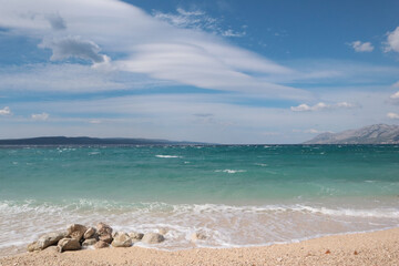Picturesque beach during a storm on a cloudy day, Baska Voda, Croatia