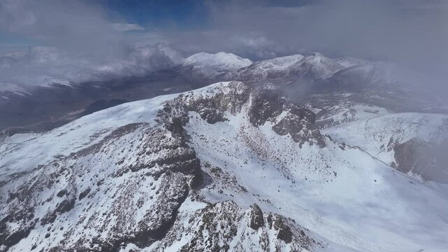 Aerial view of Ojos del Salado majestic peak of world's highest volcano Chile-Argentina border. Captured from air peak of Ojos del Salado stands highest volcano on Earth Chilean and Argentine border.
